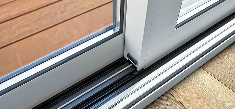 Why Your Sliding Door Keeps Getting Stuck in Lansing, MI?